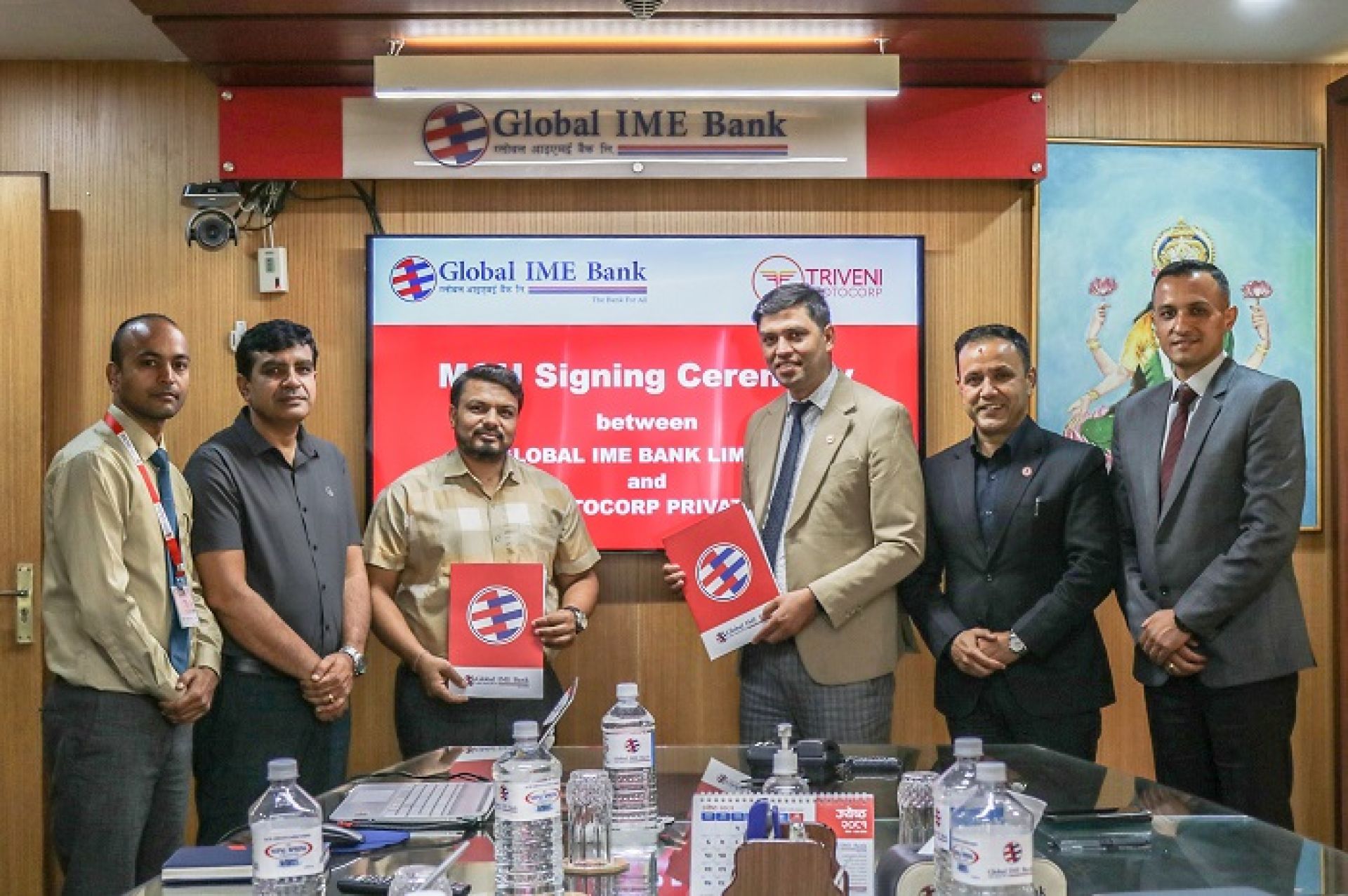 ग्लोबल आइएमई बैंक र त्रिवेणी मोटोकर्पबीच विद्युतीय सवारी कर्जा दिने सम्झौता 